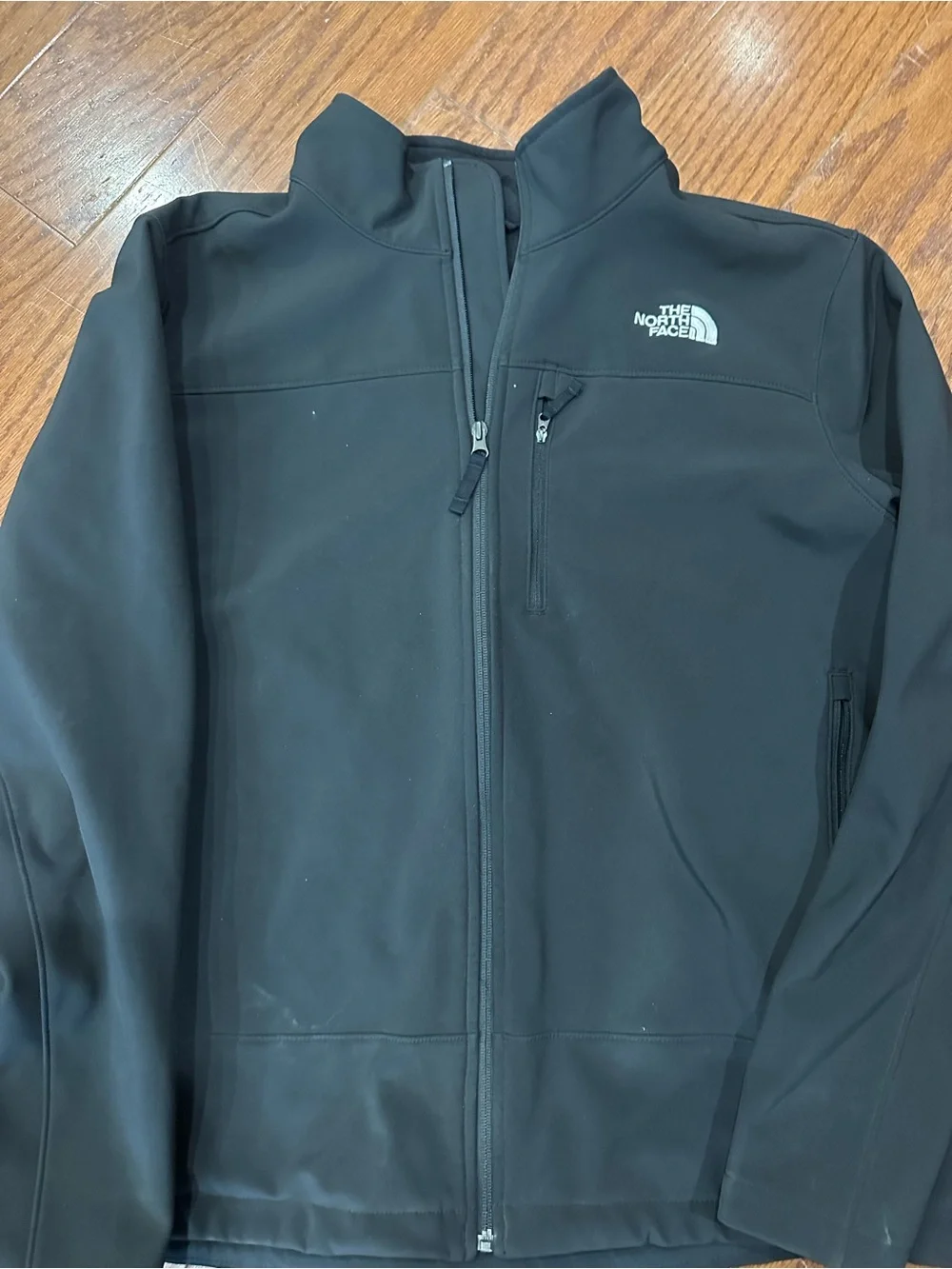 The North Face Men's Black Softshell Jacket with Zip Pockets